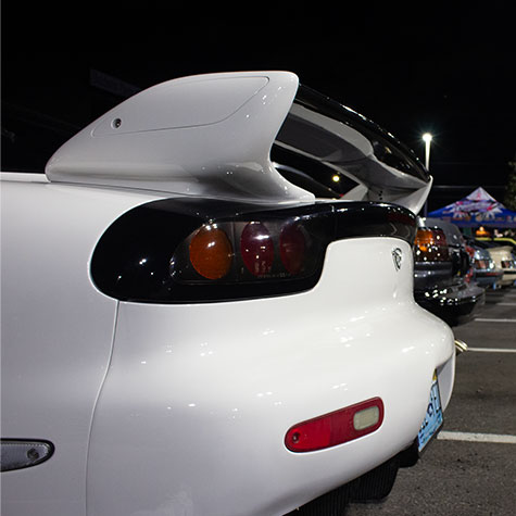 Mazda RX-7 rear end in parking lot